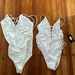 White VICI one piece (size small & medium available)